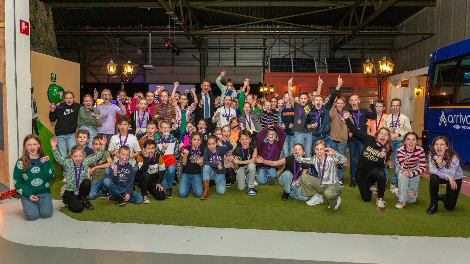 kinderen juichend op de foto in de Risk Factory